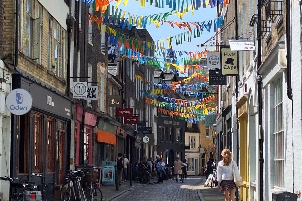 Green Street, Cambridge with the summer bunting flowing in the sunshine.