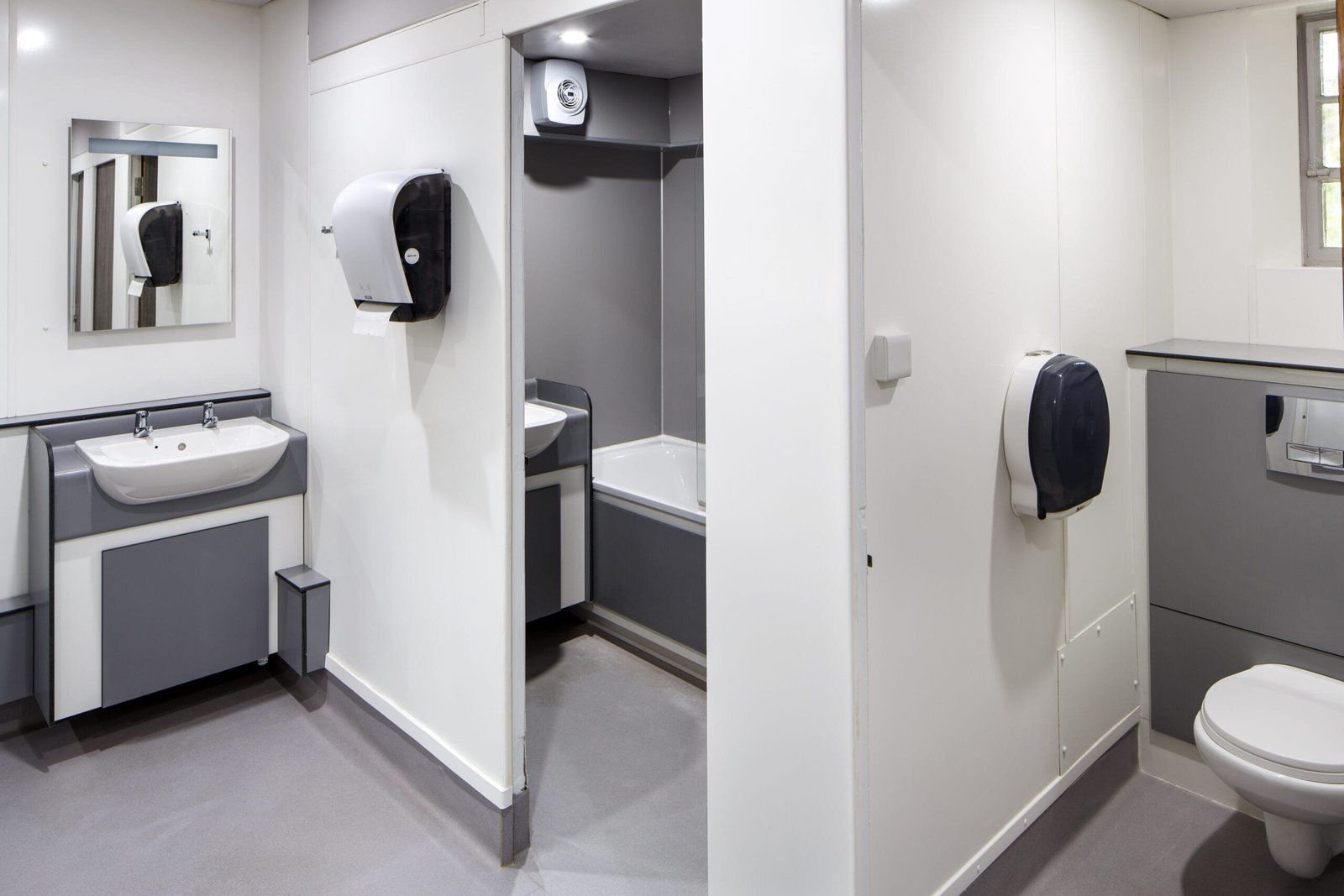A shared bathroom with shower cubicles at Christ’s College, Cambridge.