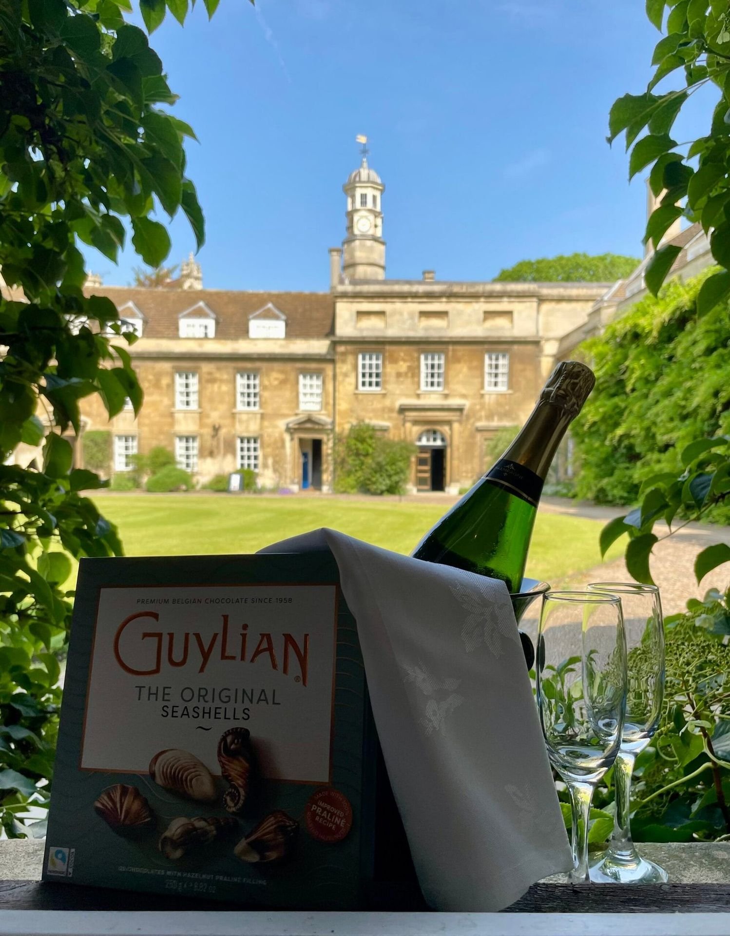 A bottle of wine on ice and a box of chocolates in the Buttery at Christ’s College, Cambridge.