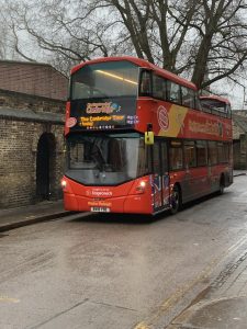 Red sightseeing bus. This is one way to travel to Cambridge and explore the sights