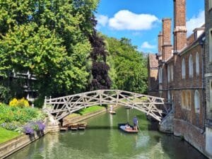 Punting under the Mathematical Bridge, Cambridge. A great instagram spot in Cambridge